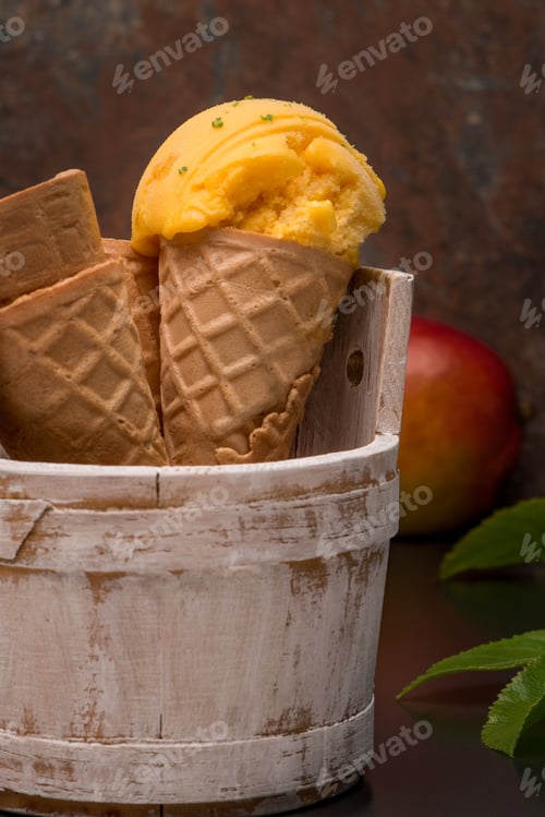 Preview: Homemade mango ice cream in waffle cone