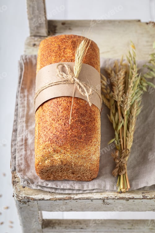 Preview: Fresh loaf of breads with ears and grain.