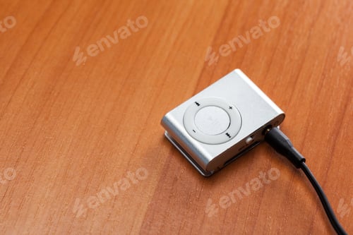 Preview: headphones on wooden background