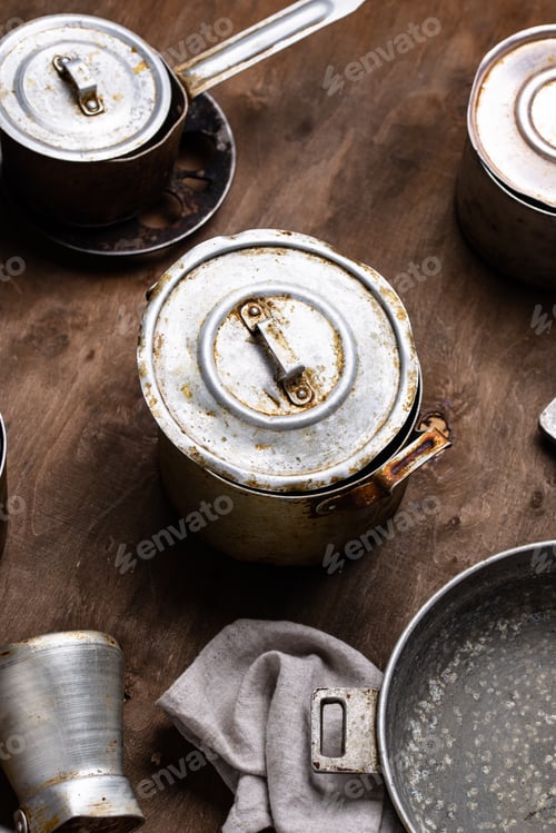 Preview: Old vintage iron pots and metallic dish