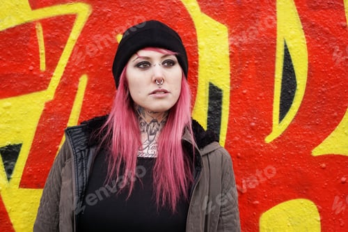Preview: young woman e-girl style in front of graffiti wall