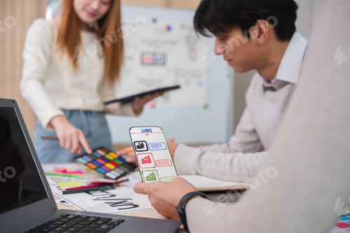 Preview: A team of designers helps develop the application system. Brainstorm ideas for making ux ui to