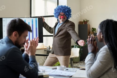 Preview: Happy clown boss making presentation