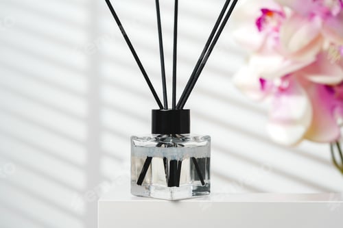 Preview: Elegant Reed Diffusers Beside Blooming Orchids in a Bright Interior Setting