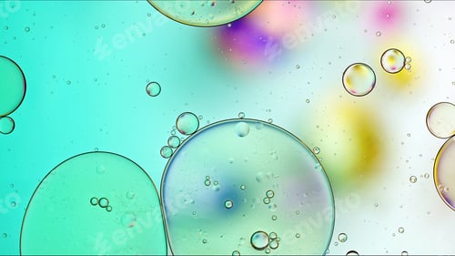 Preview: Abstract Colorful Food Oil Drops Bubbles and spheres Flowing on Water Surface