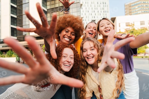 Preview: Group of only girls, gesturing with the hands and looking at camera. Five young diverse women