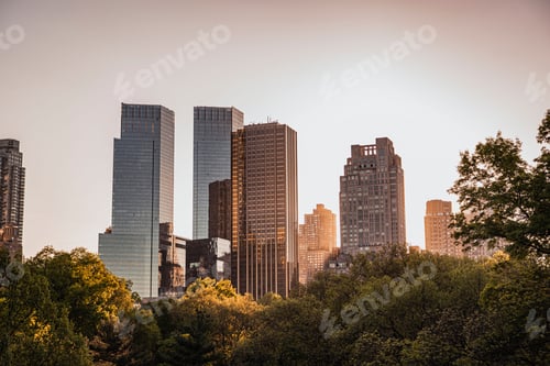 Preview: Breathtaking view of the New York City skyline at sunset, featuring the iconic Central Park.