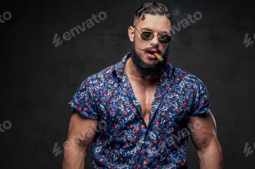 Preview: Self confident bodybuilder in glasses posing with cigar