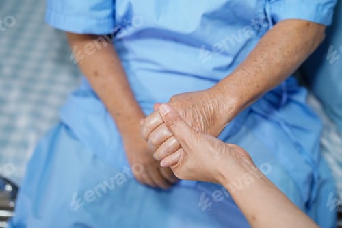 Preview: Holding Touching hands Asian senior or elderly old lady woman patient with love,