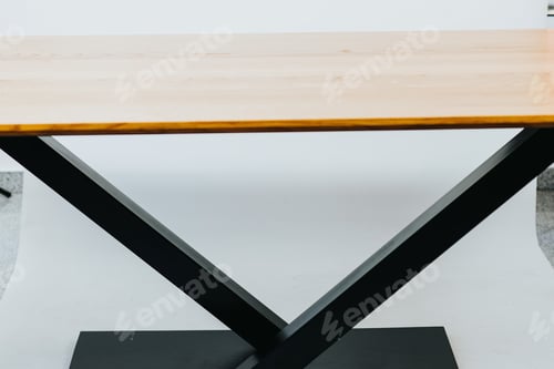 Preview: Table made of a wooden surface and black metal