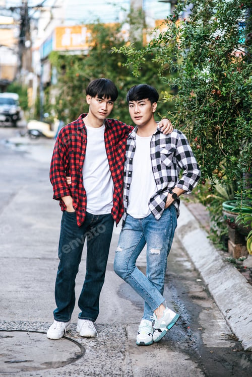 Preview: Two men who love each other happily hug each other.