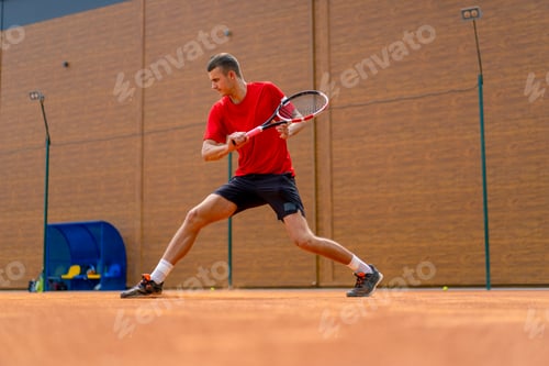 Preview: young professional player coach on outdoor tennis court practicing strokes with racket