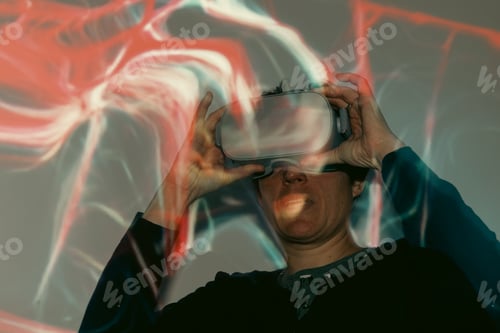 Preview: Woman adjusting the VR goggles on the light effects background