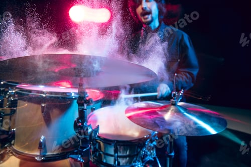 Preview: Drummer's rehearsing on drums before rock concert. Man recording music on drumset in studio