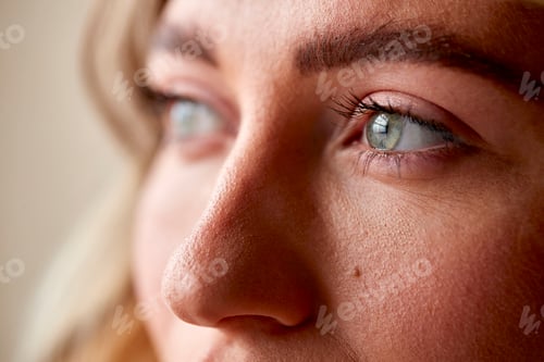 Preview: Studio Portrait Shot Face And Eyes Of Confident Natural Woman