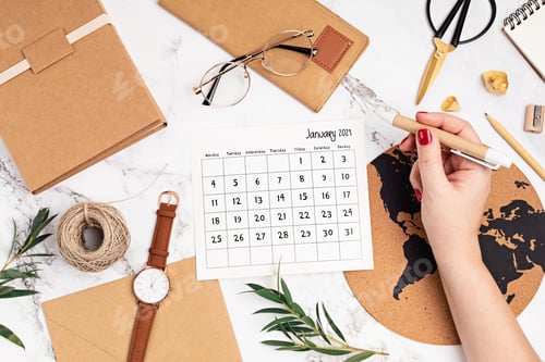 Preview: Desktop with calendar for january 2021 and office supplies. home office, social media blog, schedule