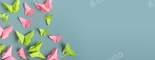 Preview: Banner with paper butterfies green and pink colors flat lay on a colored background. Copy space