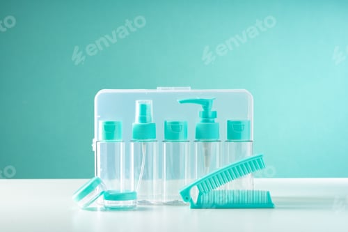 Preview: Clear containers for beauty products arranged on a white surface against a bright blue background