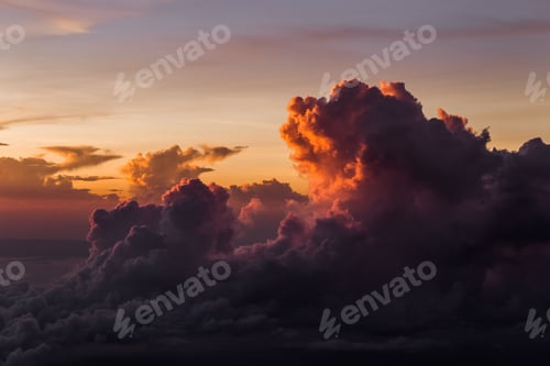 Preview: Amazing colorful sunrise at top of Agung Volcano in Bali. Multicolor cloud pattern at background