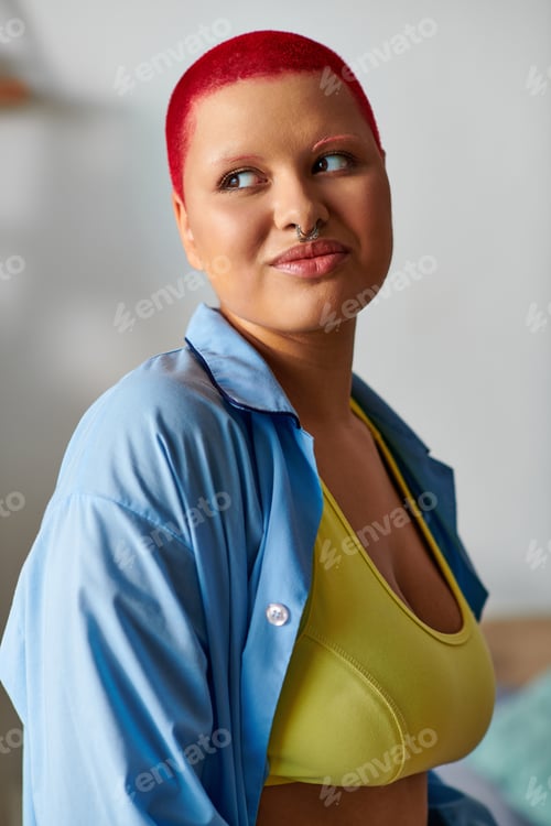 Preview: A confident young woman embraces her unique style at home in vibrant colors and comfort