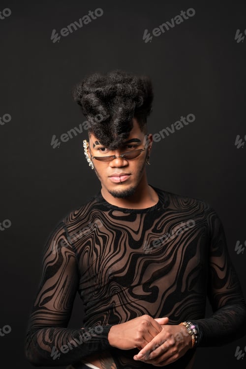 Preview: Young musician posing with trendy hairstyle and stylish clothing