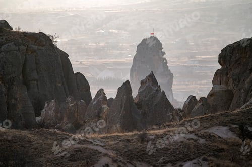 Preview: Beautiful landscape photo of ancient Ortahisar Castle in Cappadocia in sunset