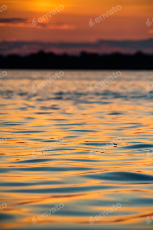 Preview: abstract background of waves at sunset