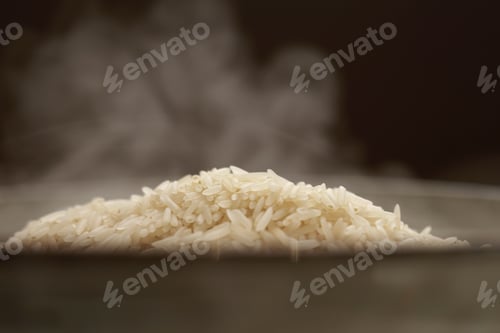 Preview: Hot white Thai jasmine long grain rice with steam in a bowl. Organic vegetarian healthy food.