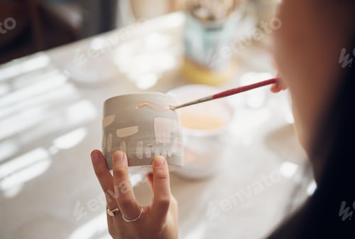 Preview: Woman hands, pottery studio and painting cup in workshop for sculpture, creative manufacturing or d