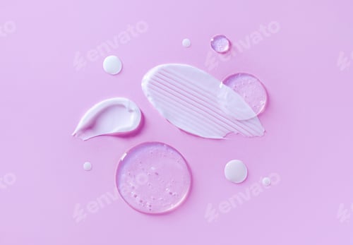 Preview: cosmetic smears cream texture on pastel pink background