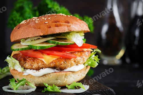 Preview: Hamburger with chicken burger meat, cheese, tomato, cucumber and lettuce