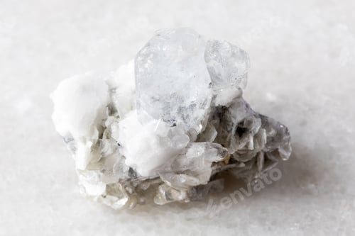 Preview: colorless beryl with mica, feldspar rock on white