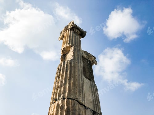 Preview: Ruins of ionic column against blue sky