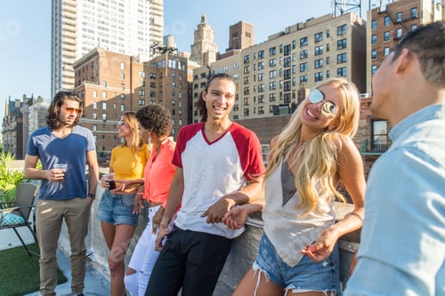 Preview: Group of friends having party on a rooftop