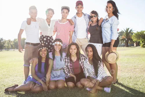 Preview: Group of happy friends posing at the park