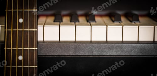 Preview: musical instruments piano keys and acoustic guitar