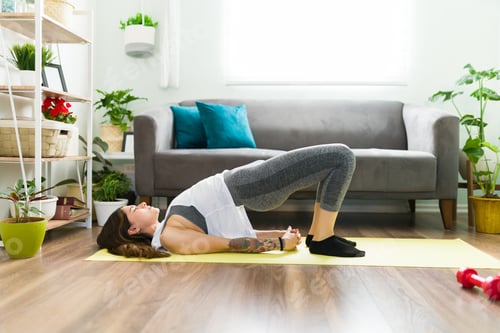 Preview: Pretty woman working out her body core at home