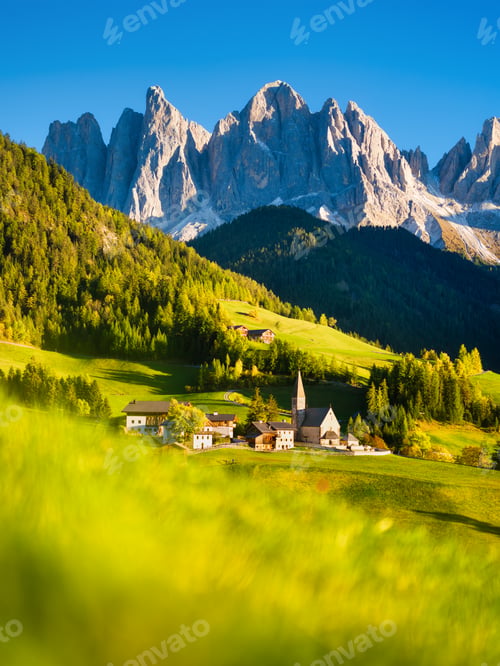Preview: Santa Maddalena. Val di Funes. Dolomite Alps. Italy. The mountains and the forest before sunset.