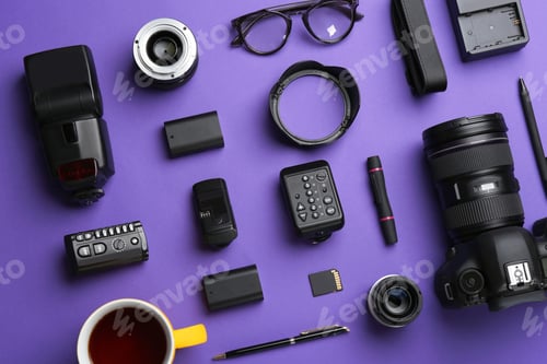 Preview: Flat lay composition with photographer's equipment and accessories on color background
