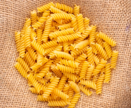 Preview: Pile of Dried Pasta on Burlap Surface