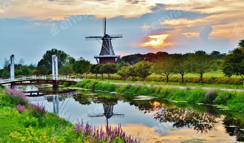 Preview: Colorful landscape of a waterway, bridge and windmill