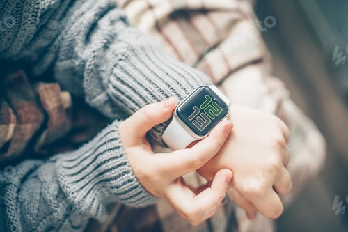 Preview: Female hands using Apple Watch