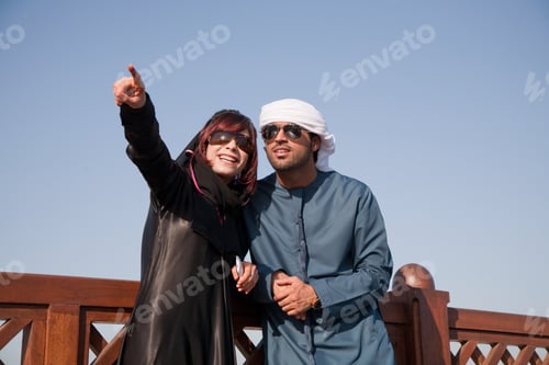 Preview: Middle Eastern people and fence, outdoors