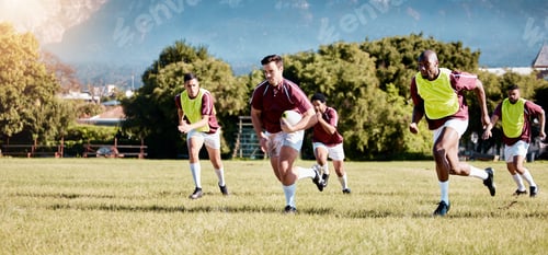 Preview: Game, sports and men playing rugby in a competition, match and running with a ball on a field. Fitn