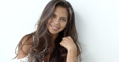Preview: Woman Smiles Wearing a Stylish White Top