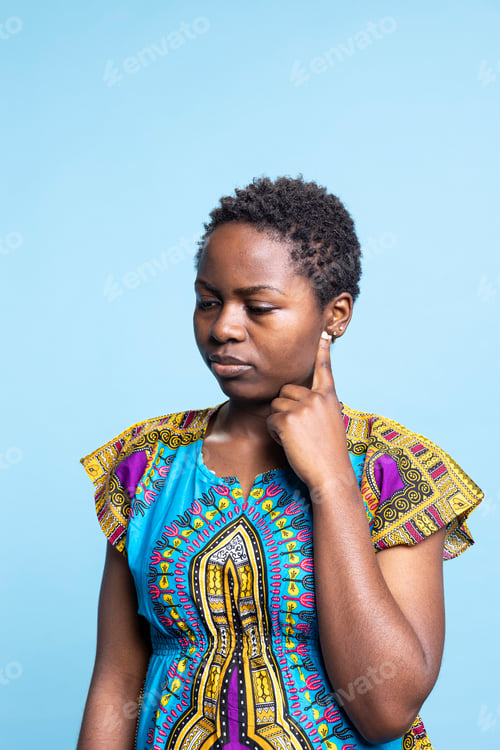 Preview: Serious young adult posing with a thoughtful expression