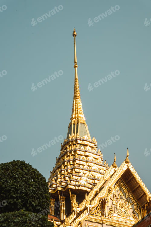 Preview: Vertical shot of a golden palace in The Grand Palace building complex in Bangkok, Thailand.