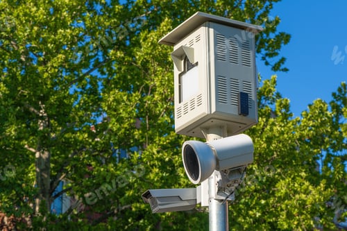 Preview: Traffic speed camera on post on sunny spring day