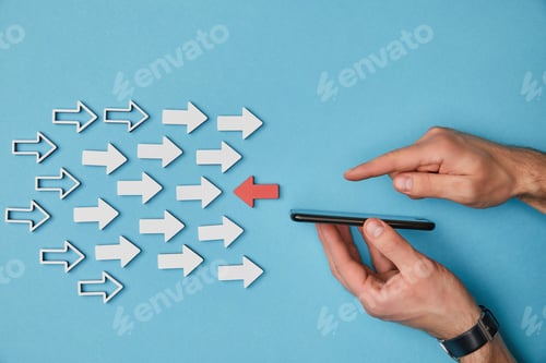 Preview: cropped view of male hands with smartphone near red horizontal pointer opposite white arrows on blue