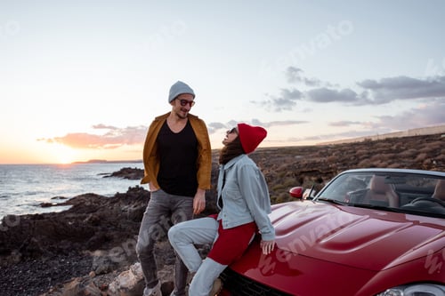 Preview: Lovely couple on the beach, traveling by car
